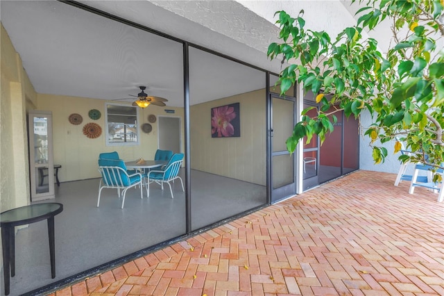 340 Pinellas Bayway S Unit 306, Tierra Verde, FL 33715 - view of patio featuring ceiling fan