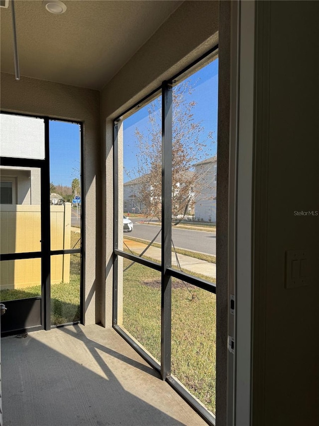 view of unfurnished sunroom