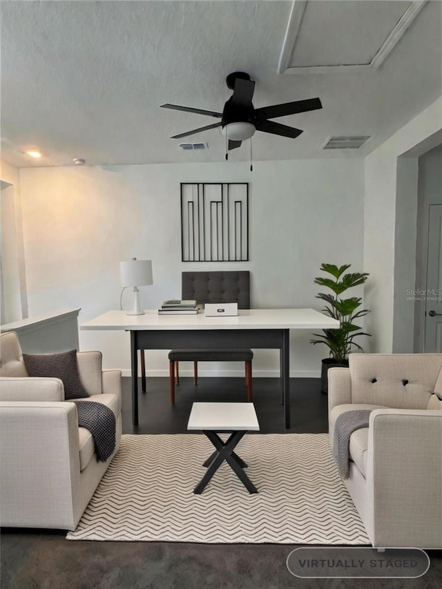 living room featuring a textured ceiling