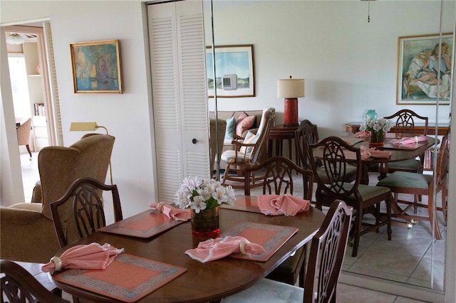 dining area with tile patterned flooring