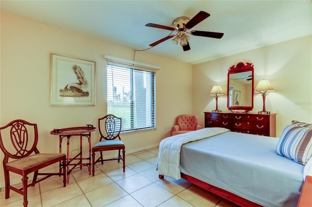 bedroom featuring light tile patterned flooring and ceiling fan