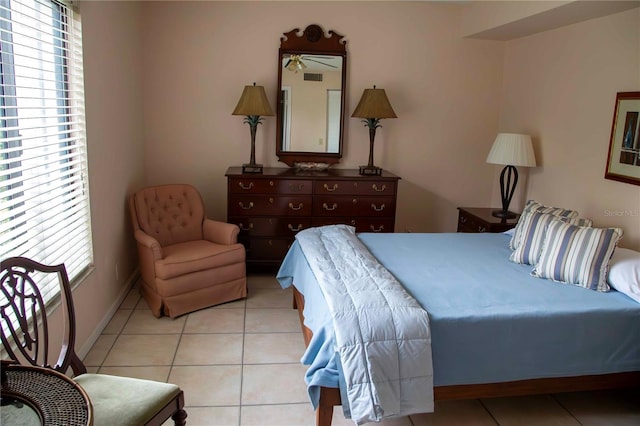 bedroom featuring light tile patterned flooring