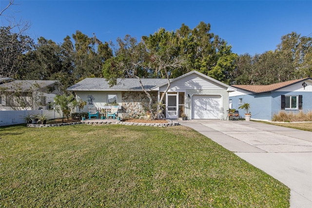 ranch-style home featuring a garage and a front yard