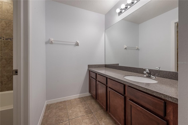 bathroom with vanity and tile patterned floors