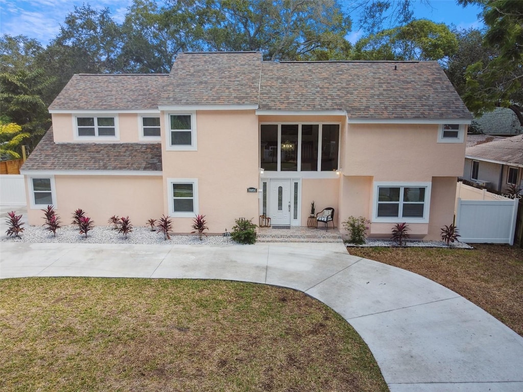 view of front of house with a front lawn