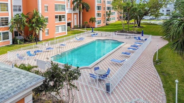 view of swimming pool featuring a patio area