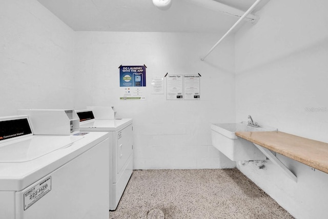 laundry area featuring washing machine and dryer