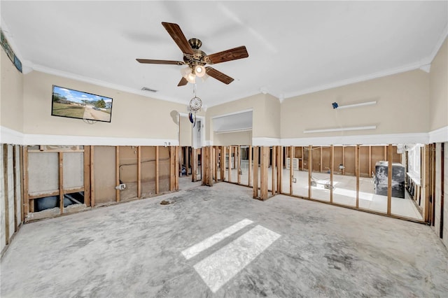 unfurnished room featuring ornamental molding and ceiling fan