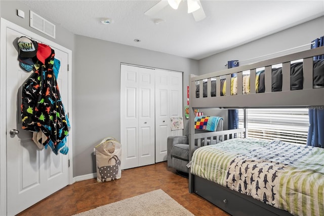 bedroom with a closet and ceiling fan