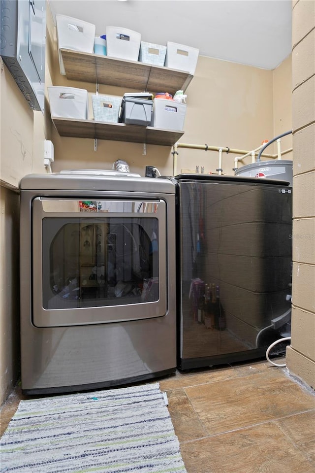 laundry area with washer / dryer