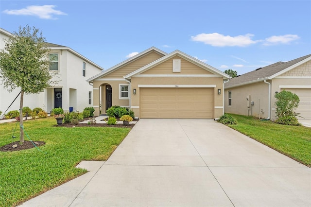 view of front of home featuring a garage and a front lawn