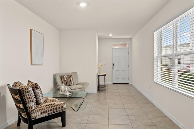 sitting room with light tile patterned floors