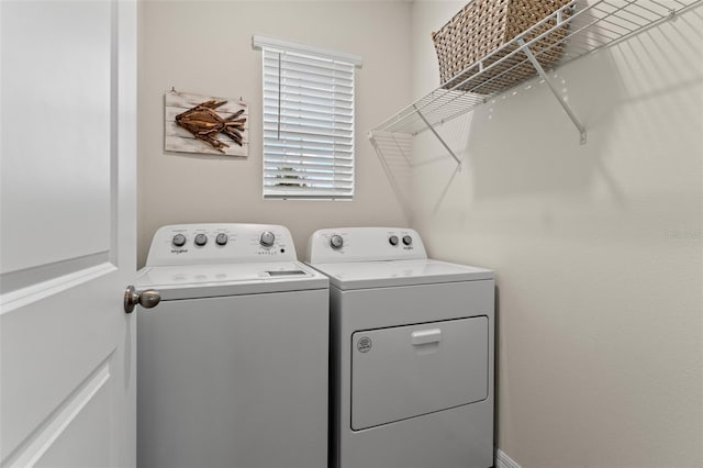 laundry area featuring independent washer and dryer