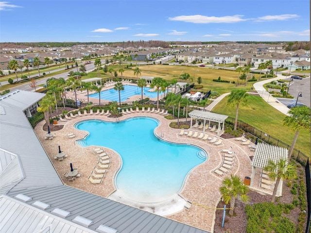 view of swimming pool featuring a patio and a pergola