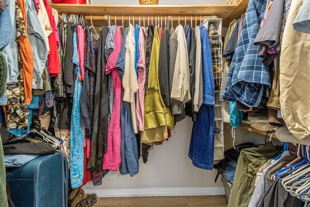 walk in closet featuring hardwood / wood-style floors