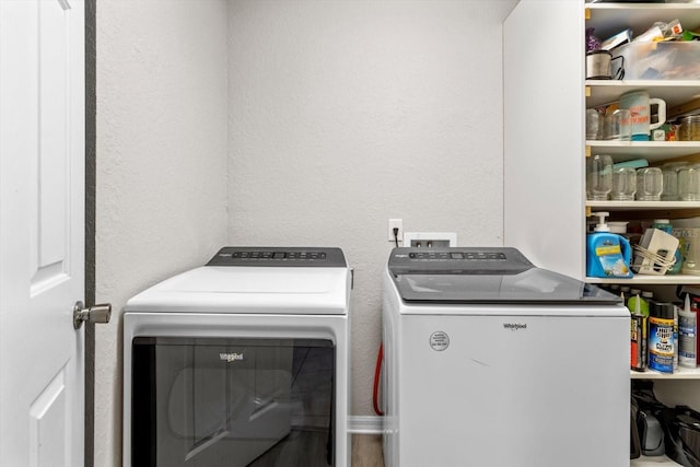 laundry room with washer and dryer