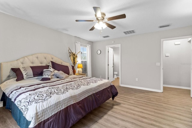 bedroom with wood-type flooring and ceiling fan