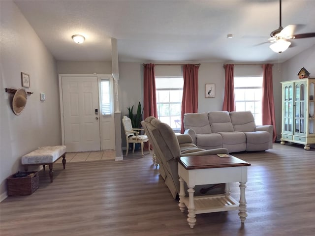 20 Hemlock Trl, Ocala, FL 34472 - living room featuring baseboards, a ceiling fan, and wood finished floors