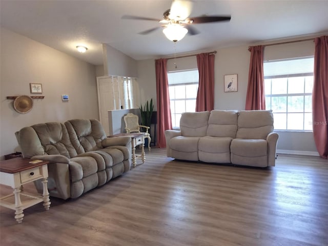 20 Hemlock Trl, Ocala, FL 34472 - living area with wood finished floors, ceiling fan, and baseboards