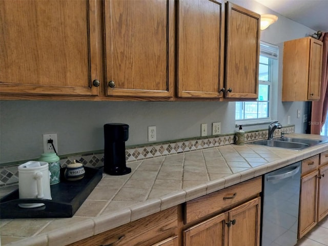20 Hemlock Trl, Ocala, FL 34472 - kitchen with a sink, dishwasher, and brown cabinets