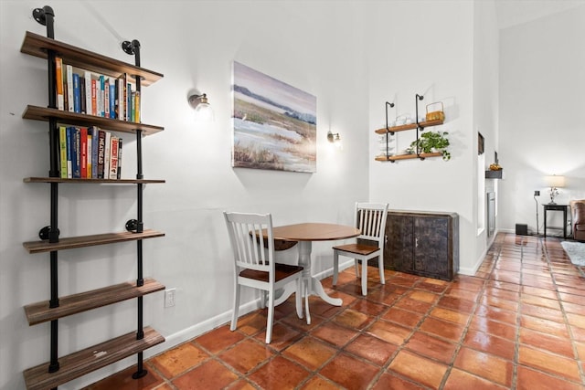 dining space featuring baseboards