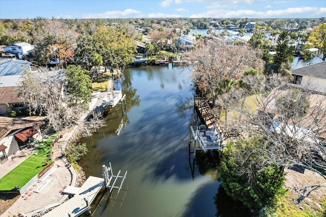 aerial overview of property's location featuring a large body of water and nearby suburban area
