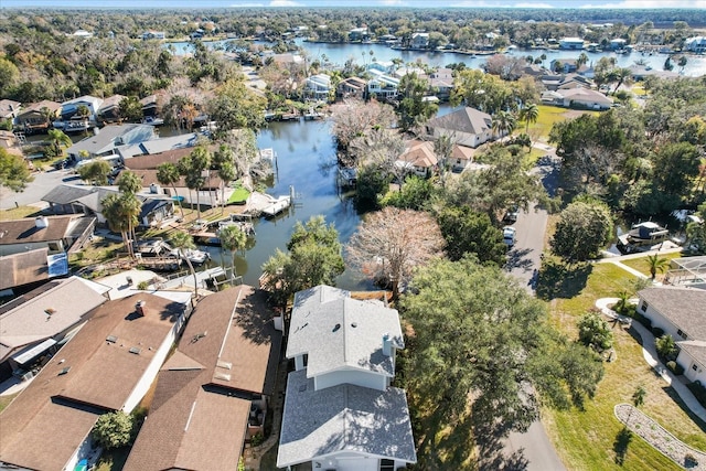 view of property location featuring nearby suburban area and a nearby body of water