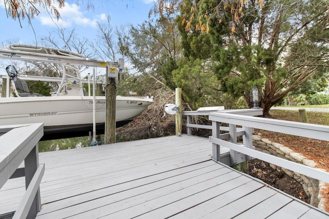 deck featuring a dock and boat lift