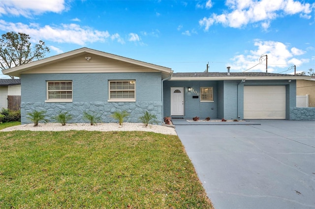 single story home with a garage and a front yard