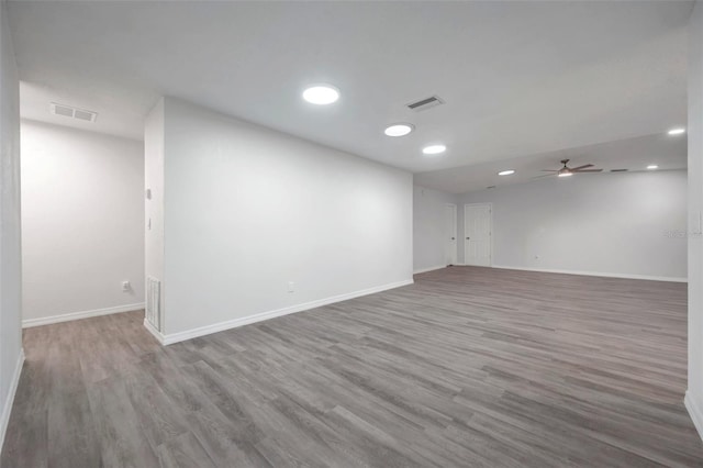 interior space with ceiling fan and wood-type flooring