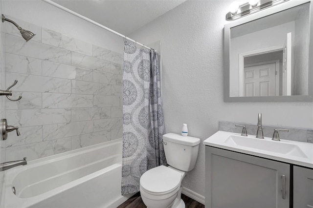 full bathroom with vanity, hardwood / wood-style floors, shower / tub combo with curtain, and toilet