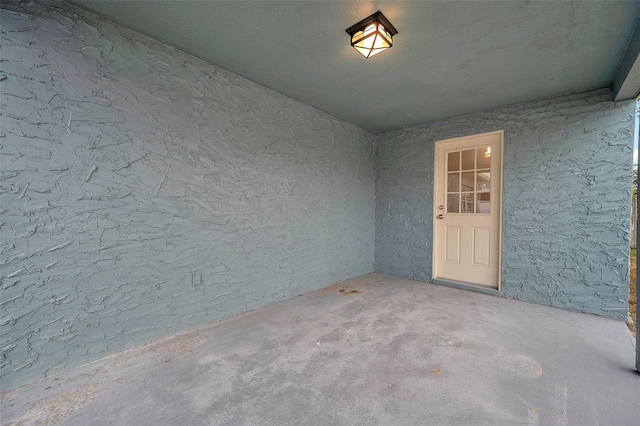 doorway to property featuring a patio area