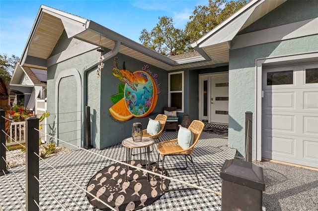 view of patio with a garage