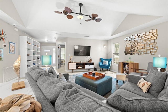 living room featuring vaulted ceiling