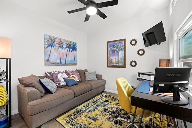 office featuring hardwood / wood-style flooring and ceiling fan