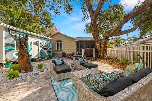 view of patio / terrace with a sunroom and an outdoor hangout area