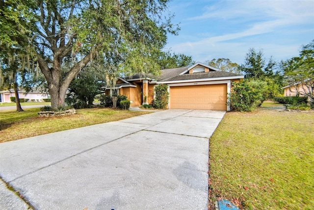 ranch-style home with a garage and a front yard