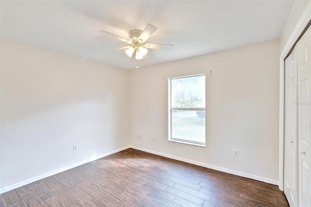 unfurnished bedroom with a closet and ceiling fan