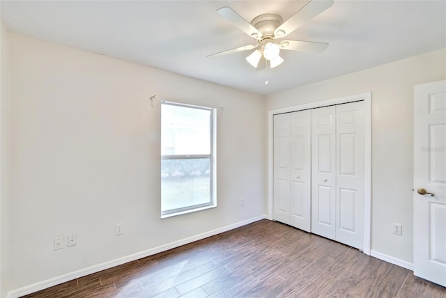 unfurnished bedroom with ceiling fan, hardwood / wood-style floors, and a closet