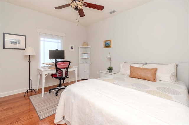 bedroom featuring ceiling fan and light wood-type flooring