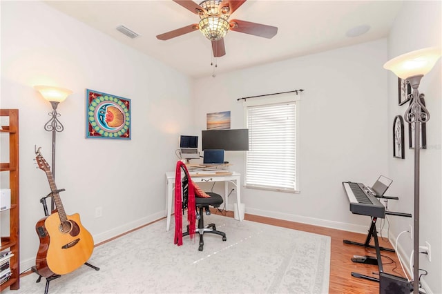 office area featuring hardwood / wood-style flooring and ceiling fan