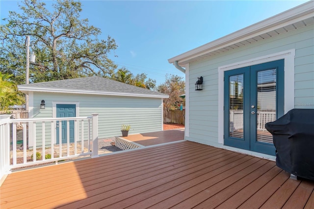 deck featuring french doors and area for grilling