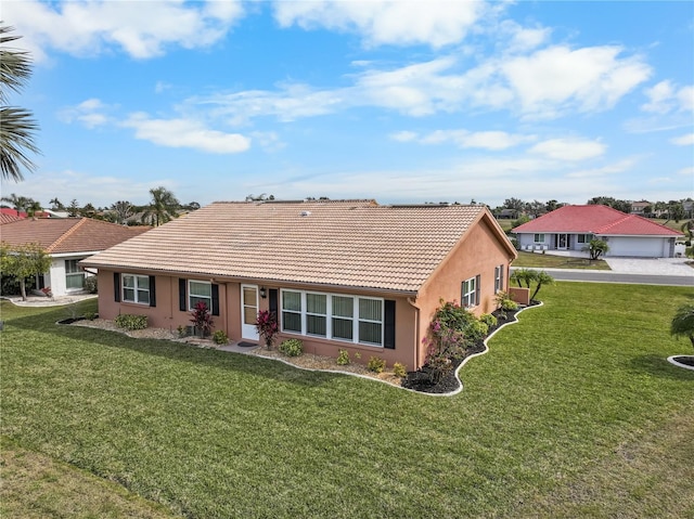 single story home with a front yard