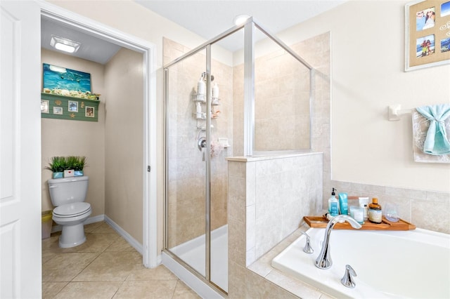 bathroom with tile patterned flooring, independent shower and bath, and toilet