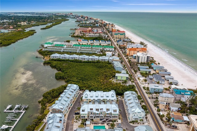 aerial view with a water view and a view of the beach