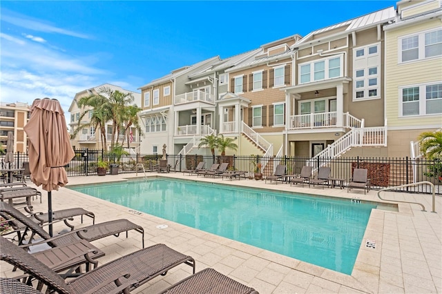 view of swimming pool with a patio area