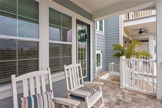 view of patio / terrace featuring covered porch and ceiling fan