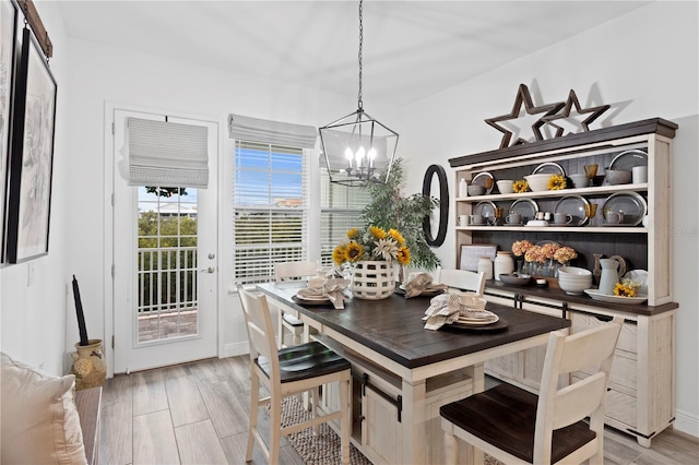 dining room with a notable chandelier