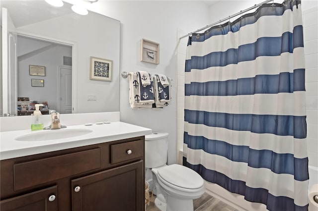 full bathroom with toilet, vanity, and shower / tub combo with curtain