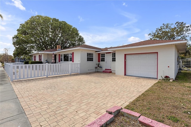 single story home with a garage